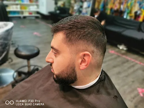 4 - Mallams African American Barber Shop & Cosmetics