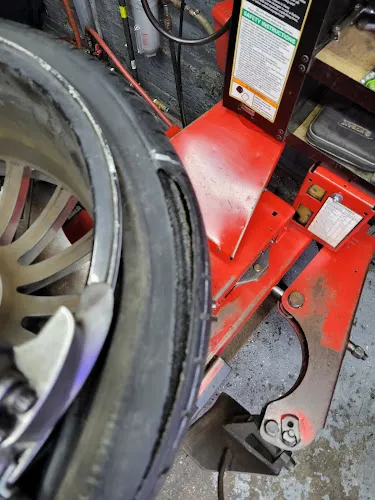 6 - Thumbs Up Tire Shop