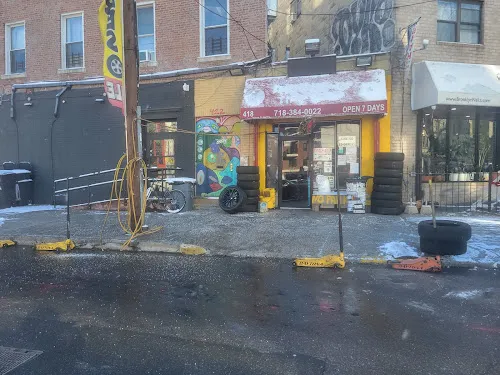 2 - Thumbs Up Tire Shop